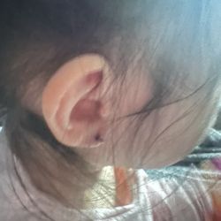The Piercings Club - A very small titanium ball.