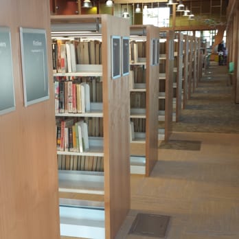 Ferndale Public Library - Aisles of books, DVDs, music CDs, and magazines are available. - Libraries Near Me - Ferndale, Washington