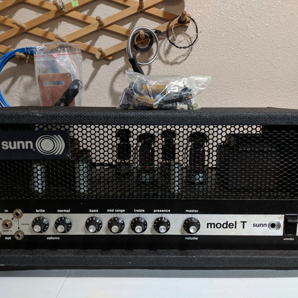 The Tone Doctor - My 1970's Sunn Model T, given new life by Steamboat Amps, with a bag full of ruined components from the fire sitting on top. - Musical Instrument Services Near Me The Tone Doctor - My 1970's Sunn Model T, given new life by Steamboat Amps, with a bag full of ruined components from the fire sitting on top. - Musical Instrument Services Near Me