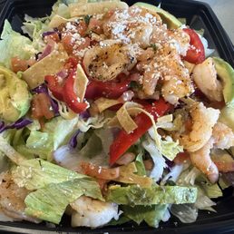 Chili Lime Salad with shrimp as an added protein option, chicken, steak, carnitas are the other protein options.