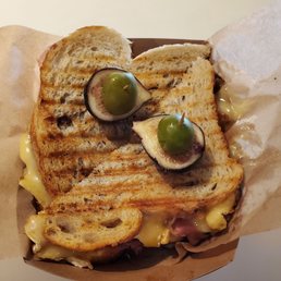 Grilled Brie, ham, and fig jam sandwich. Best I have ever had!! Grilled Brie, ham, and fig jam sandwich. Best I have ever had!!