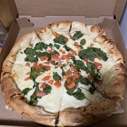 MONTE CRISTO White pizza with spinach, sun-dried tomatoes, fresh tomatoes, mozzarella and ricotta cheeses