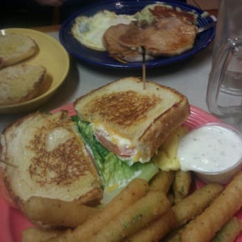 Eggs Etc - My sammie and his porkchops and uber runny eggs - Breakfast & Brunch Near Me - Long Beach, California