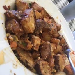 BC bowl- 2/3 potatoes if not more! Order the smaller portion unless you want to pack fried potatoes for home lol