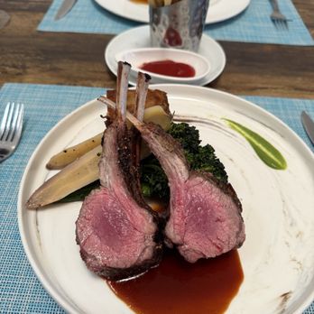 F&B - Rack of lamb. I'm a huge lamb fan and this was cooked to perfection! - New American Near Me - South Padre Island, Texas F&B - Rack of lamb. I'm a huge lamb fan and this was cooked to perfection! - New American Near Me - South Padre Island, Texas