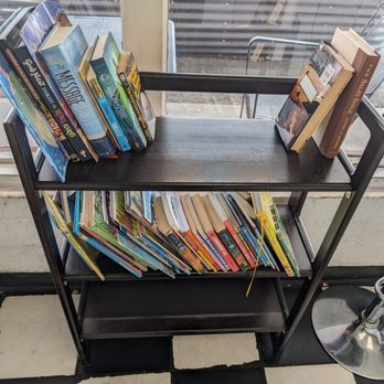 Mytiburger - Few fast food joints these days have lending libraries. - Burgers Near Me - Houston, Texas