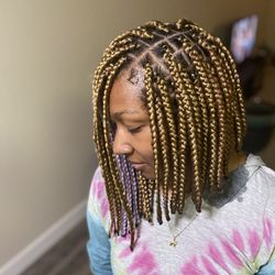 Medium Box Braids styled into a Bob