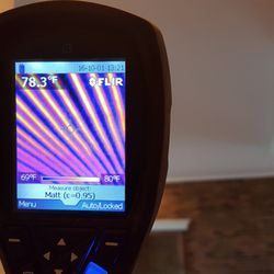 Ultimate Home Inspection - Thermal image of buried heat lines in a concrete ceiling