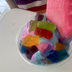 Bubble gum ice cream and popsicle with gummy bear topping