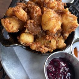 Cheese curds with a blueberry jam dipping sauce and Hot honey sauce 10/10 Cheese curds with a blueberry jam dipping sauce and Hot honey sauce 10/10