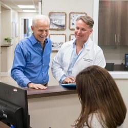 Coastal Vein and Vascular Specialists - Dr. Christopher W. Boyes of Coastal Vein and Vascular Specialists with a Patient