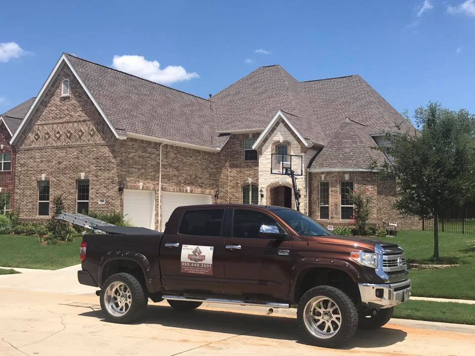 Slide of Cowboys Roofing