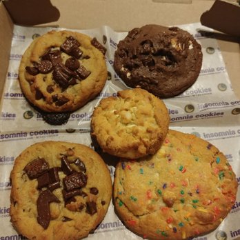 Insomnia Cookies - Triple chocolate (x2), Smores, white chocolate macadamia nut, and confetti cookies - Desserts Near Me - Wilmington, North Carolina Insomnia Cookies - Triple chocolate (x2), Smores, white chocolate macadamia nut, and confetti cookies - Desserts Near Me - Wilmington, North Carolina