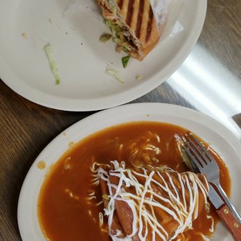 Pepe's Tortas - Best way to eat a torta, half normal the other half smothered in sauce, una torta ahogada - Mexican Near Me - Perris, California