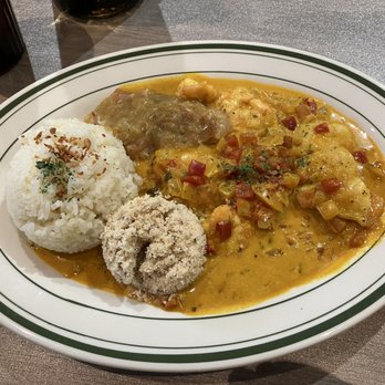 Basil Brazil Cuisine - a plate of food with rice and meat - Brazilian Near Me - San Juan Capistrano, California