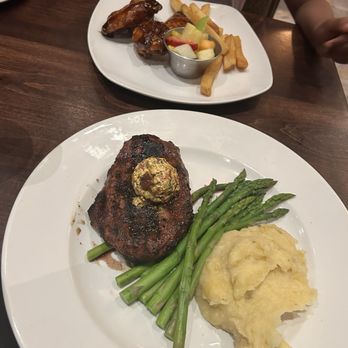 Firebirds Wood Fired Grill - Sirloin, Parmesan Mashed Potatoes, Asparagus; kids wings and fries with fruit - Seafood Near Me - Gainesville, Virginia Firebirds Wood Fired Grill - Sirloin, Parmesan Mashed Potatoes, Asparagus; kids wings and fries with fruit - Seafood Near Me - Gainesville, Virginia