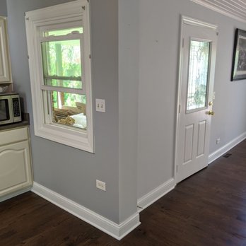 Zudor Flooring - a view of a kitchen and dining room - Flooring Near Me