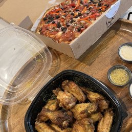Lemon Pepper wings and Combination pizza Lemon Pepper wings and Combination pizza