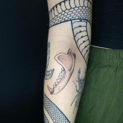 Sphynx Tattoo & Piercing - Badger jaw by Enya