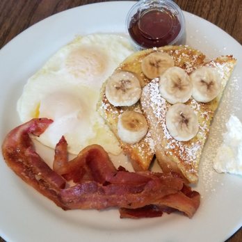 Moke's Bread & Breakfast - Breakfast plate: banana pancakes, bacon, eggs - Breakfast & Brunch Near Me - Kailua, Hawaii Moke's Bread & Breakfast - Breakfast plate: banana pancakes, bacon, eggs - Breakfast & Brunch Near Me - Kailua, Hawaii