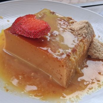 Quiubo - Flan ($10): vanilla custard w/caramel, rompope, and cookie crumbs - Mexican Near Me - Naperville, Illinois Quiubo - Flan ($10): vanilla custard w/caramel, rompope, and cookie crumbs - Mexican Near Me - Naperville, Illinois