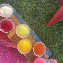 A tasting flight of all 6 flavors of the wine slushees!