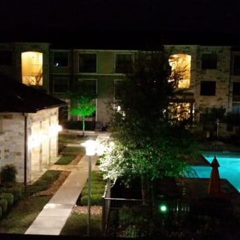 Westover Oaks - View of the pool at night. - Apartments Near Me - San Antonio, Texas Westover Oaks - View of the pool at night. - Apartments Near Me - San Antonio, Texas