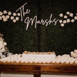 Monica's Bride & Floral - Floral for cake and greenery wall