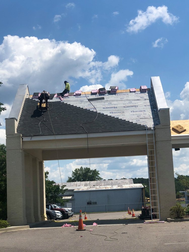 Slide of Hixon's Roofing