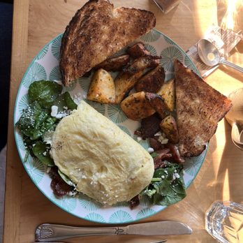 Artemisia Cafe - Bacon, spinach, and goat cheese omelet. I can't rave enough! It's fantastic. The inlet was cooked perfectly - Breakfast & Brunch Near Me - Portland, Maine