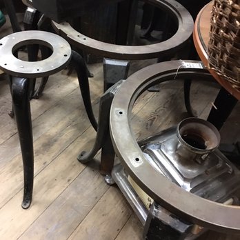 Aurora Mills Architectural Salvage - Cast iron legs mated with steel rings - Antiques Near Me - Aurora, Oregon