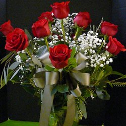 Blooms at the Hills Florist - Dozen Roses, Babies Breath, Fancy Assorted Greens, Ribbon  $97