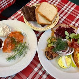Cold-smoked salmon; Theater platter: roast pork, plaice, meatball, herring, chicken salad