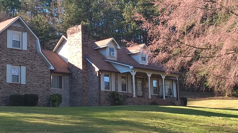 Slide of Midian Roofing