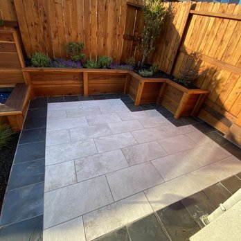 A.D. Landscape Service - Tile patio #2 with custom retaining wall - Landscaping Near Me - Sacramento, California