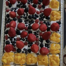 Joe’s International Market - A fluffy dessert with mango or fruits or pistachio cream in Nutella with kanfa and whipped cream