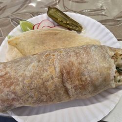 A really well-done chicken burrito. I let the worker pick the drink for me. He selected horchata. It was great.