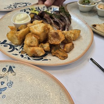 Delos Greek Restaurant - Potato and lamb chops - Greek Near Me - New York, New York Delos Greek Restaurant - Potato and lamb chops - Greek Near Me - New York, New York