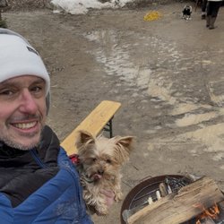 ZOMburger's - My dogaughter and I standing by the fire waiting for our food. She was licking her chops waiting!