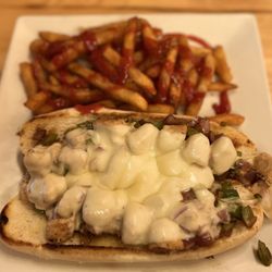 Badlands Saloon & Grille - Chicken Philly with fries