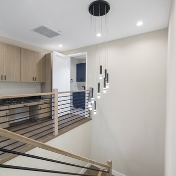 Tenaya Construction - a view of a kitchen and staircase - General Contractors Near Me Tenaya Construction - a view of a kitchen and staircase - General Contractors Near Me