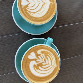Royal Flamingo Coffee - One regular signature latte with oat milk and then another signature latte extra shot with oat milk - Coffee Roasteries Near Me - Columbus, Ohio Royal Flamingo Coffee - One regular signature latte with oat milk and then another signature latte extra shot with oat milk - Coffee Roasteries Near Me - Columbus, Ohio