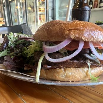 Butcher & Baker Provisions - Burger with added bacon and salad - Bakeries Near Me - Port Gamble, Washington