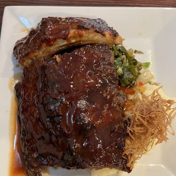 Palm Grill - Half Rack of Ribs with mashed potatoes and collard greens - New American Near Me - Valley Stream, New York Palm Grill - Half Rack of Ribs with mashed potatoes and collard greens - New American Near Me - Valley Stream, New York