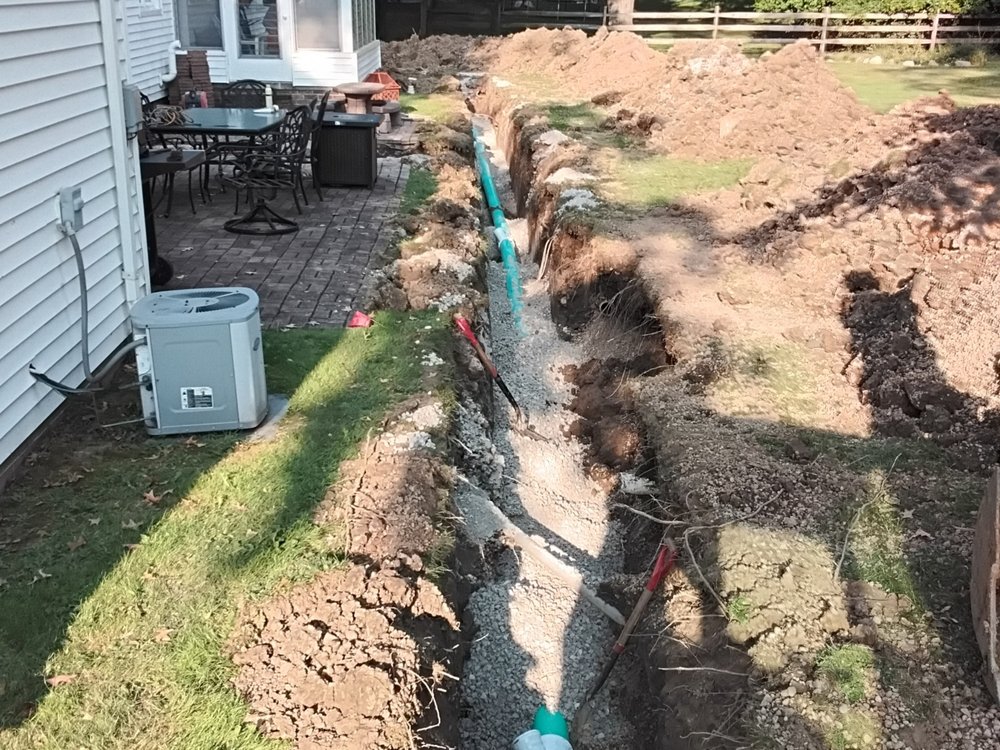 Slide of Rogers Drain Solutions