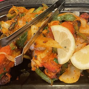 Amul India Restaurant - Tandoori Chicken. Rice came with it but is not pictured. - Indian Near Me - Dublin, Ohio Amul India Restaurant - Tandoori Chicken. Rice came with it but is not pictured. - Indian Near Me - Dublin, Ohio