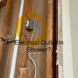Entrusted Restoration - Not removed until I blue taped it.  Electrical outlet in the shower.