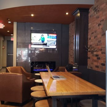 Coffee Culture - a long table with a laptop on it - Coffee & Tea Near Me - Oshawa, Ontario Coffee Culture - a long table with a laptop on it - Coffee & Tea Near Me - Oshawa, Ontario