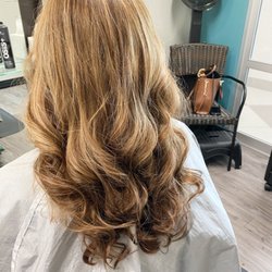 Hair by Kerry - Retouched her new growth. Added some baby lights to brighten up her color.