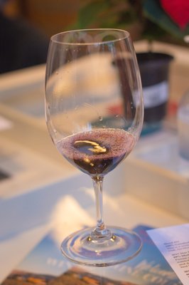 Photo of Baer Winery - Woodinville, WA, US. a glass of wine on a table